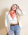 Leto Collection dotted and floral bandana with coral and red patterns, made of soft fabric, shown laid flat.