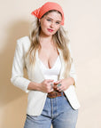 Leto Collection dotted and floral bandana with coral and red patterns, featuring vibrant design on soft fabric.