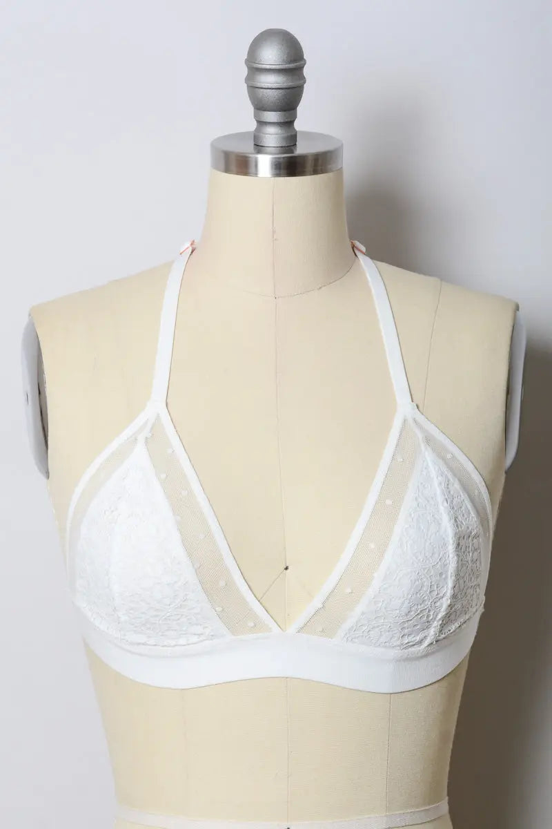White crochet T-back bralette by Leto Collection featuring intricate lace details and a comfortable fit.