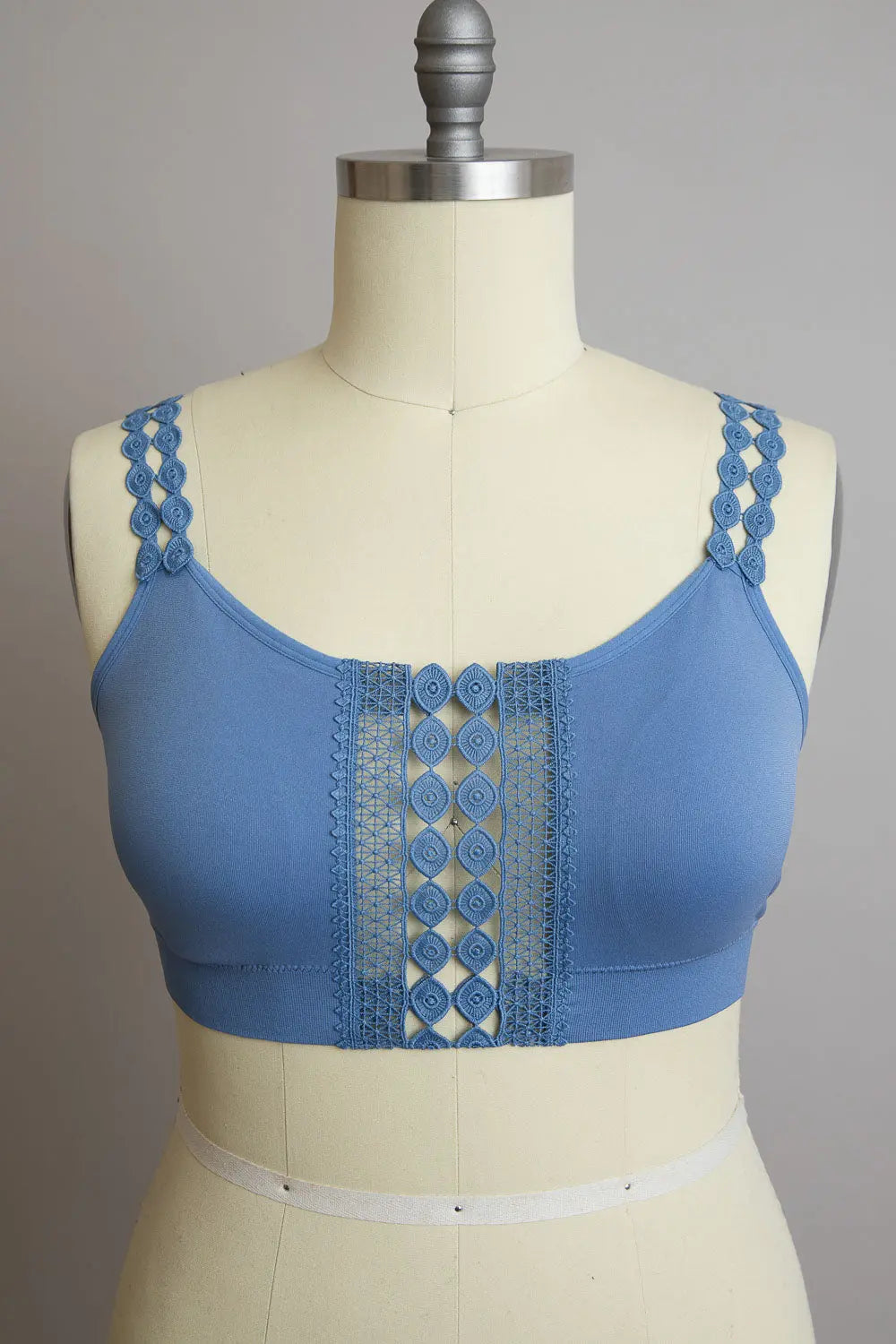 Blue Leto Collection Eye Lace Applique Bralette featuring intricate lace details and soft fabric for comfortable wear.