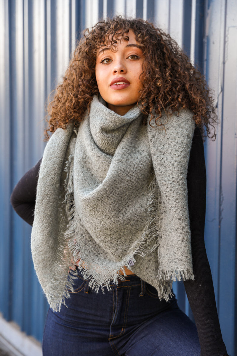 Leto Collection mohair square scarf in sage green, showcasing soft, textured fabric and stylish, versatile design.
