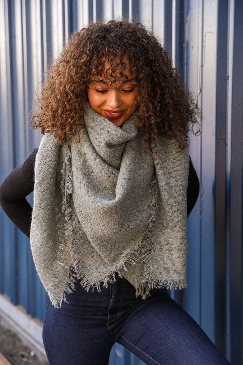 Leto Collection mohair square blanket scarf in sage green with a soft, cozy texture and stylish fringed edges.