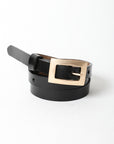 Black chic slim waist belt with durable gold buckle design.