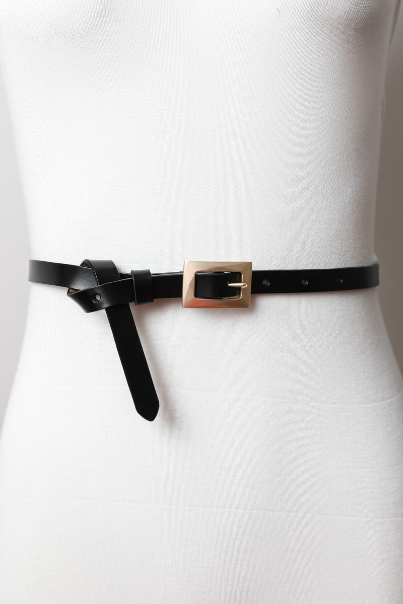 Black versatile gold buckle belt for dresses and casual wear.