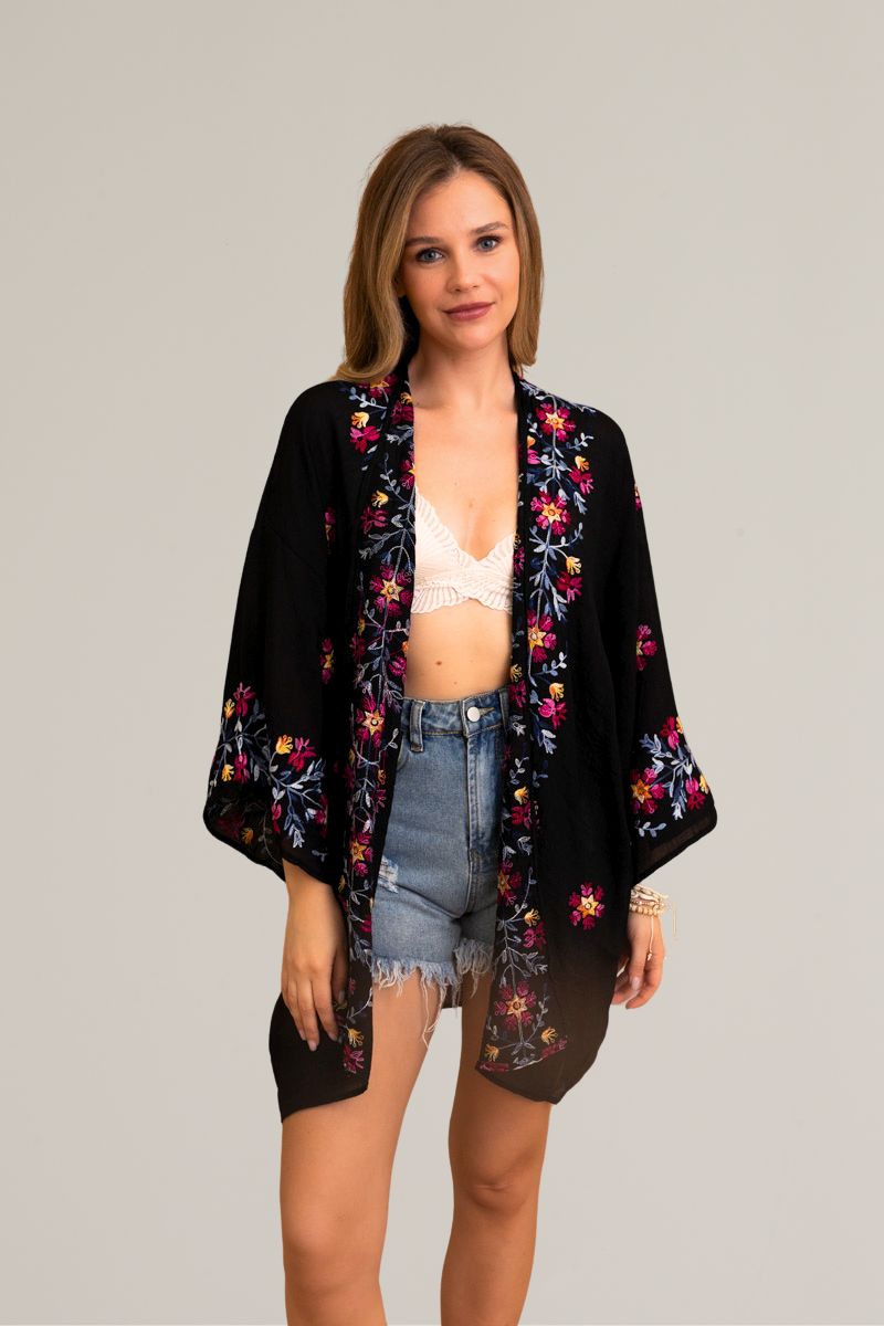 Chic ethereal anemone black kimono with sophisticated floral details.