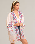 Chic floral embroidered white kimono for layering and style.