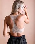 Elegant lacey beige racerback bralette with wireless and stretchy fabric.