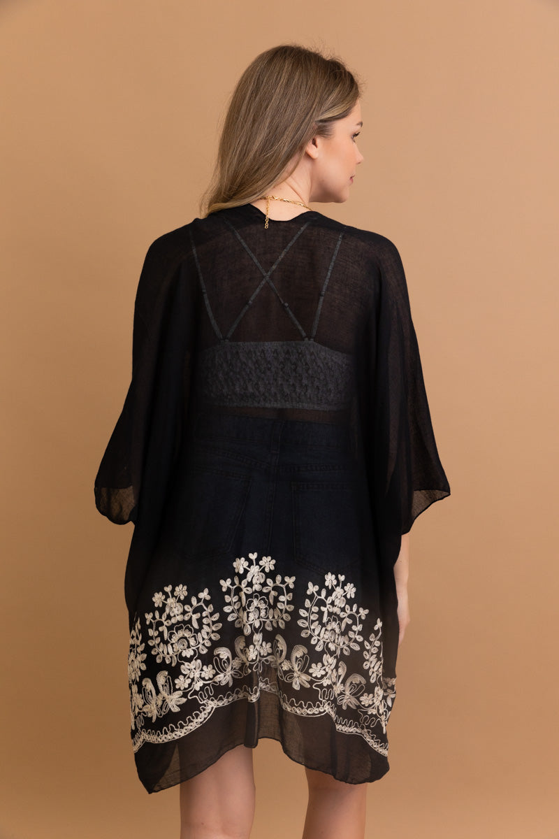 Floral embroidery black kimono for layering and style.