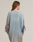 Floral embroidery sage kimono made from viscose and polyester blend.