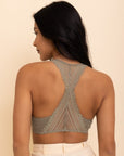 Lacey racerback seamless sage bralette with soft and stretchy lace design.