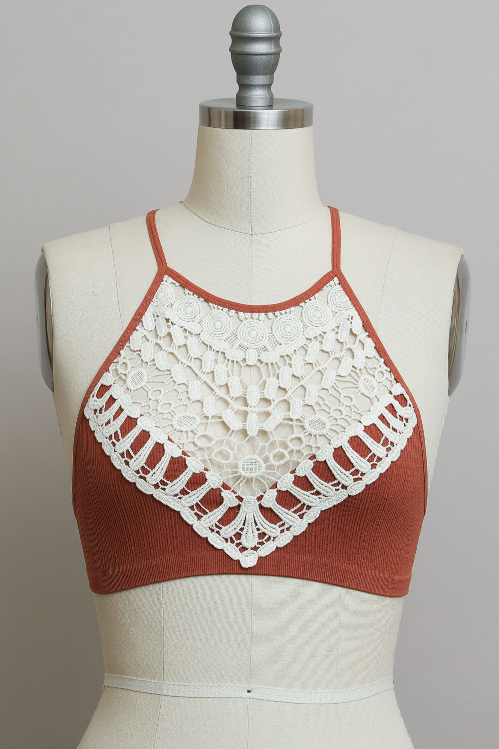 Lightweight crochet halter rust bralette with elegant design.