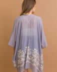 Lightweight floral blue kimono crafted with quality viscose blend.