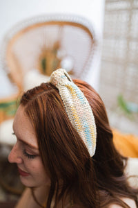 Lightweight twine woven knotted baby blue white headband for all-day comfort.