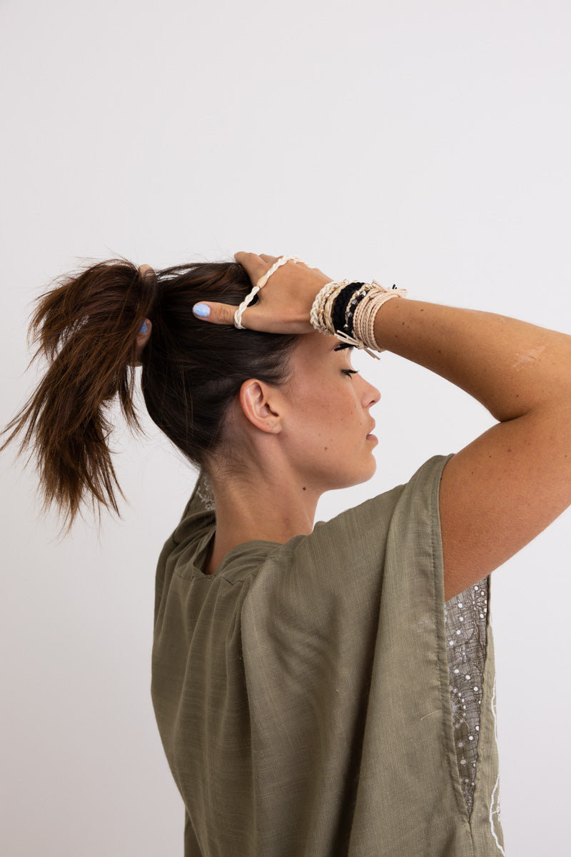 Multi-color bows and knots hair tie bracelet set for stylish looks.