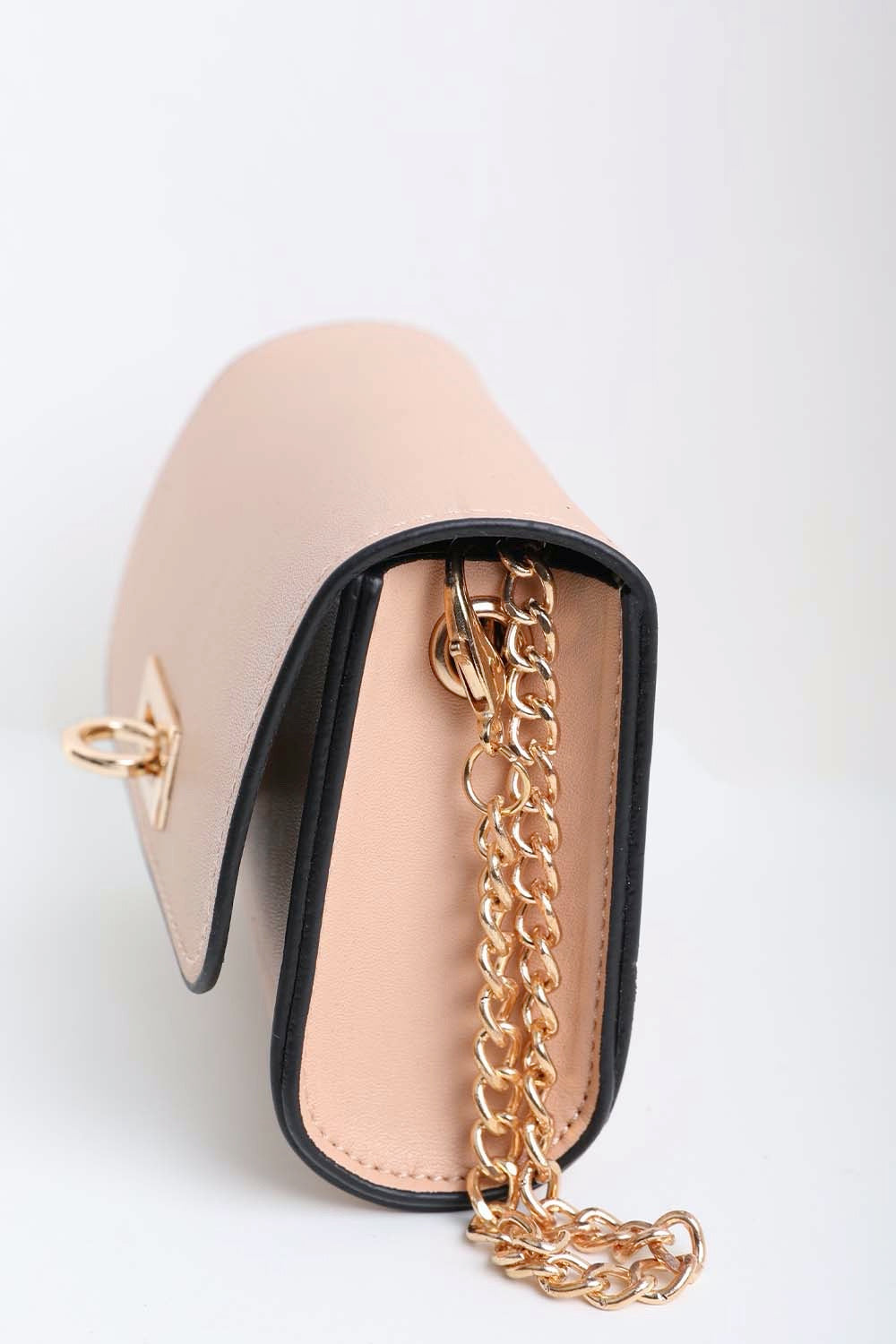 Nude fashionable mini belt bag featuring gold link chain.