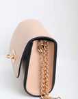 Nude fashionable mini belt bag featuring gold link chain.