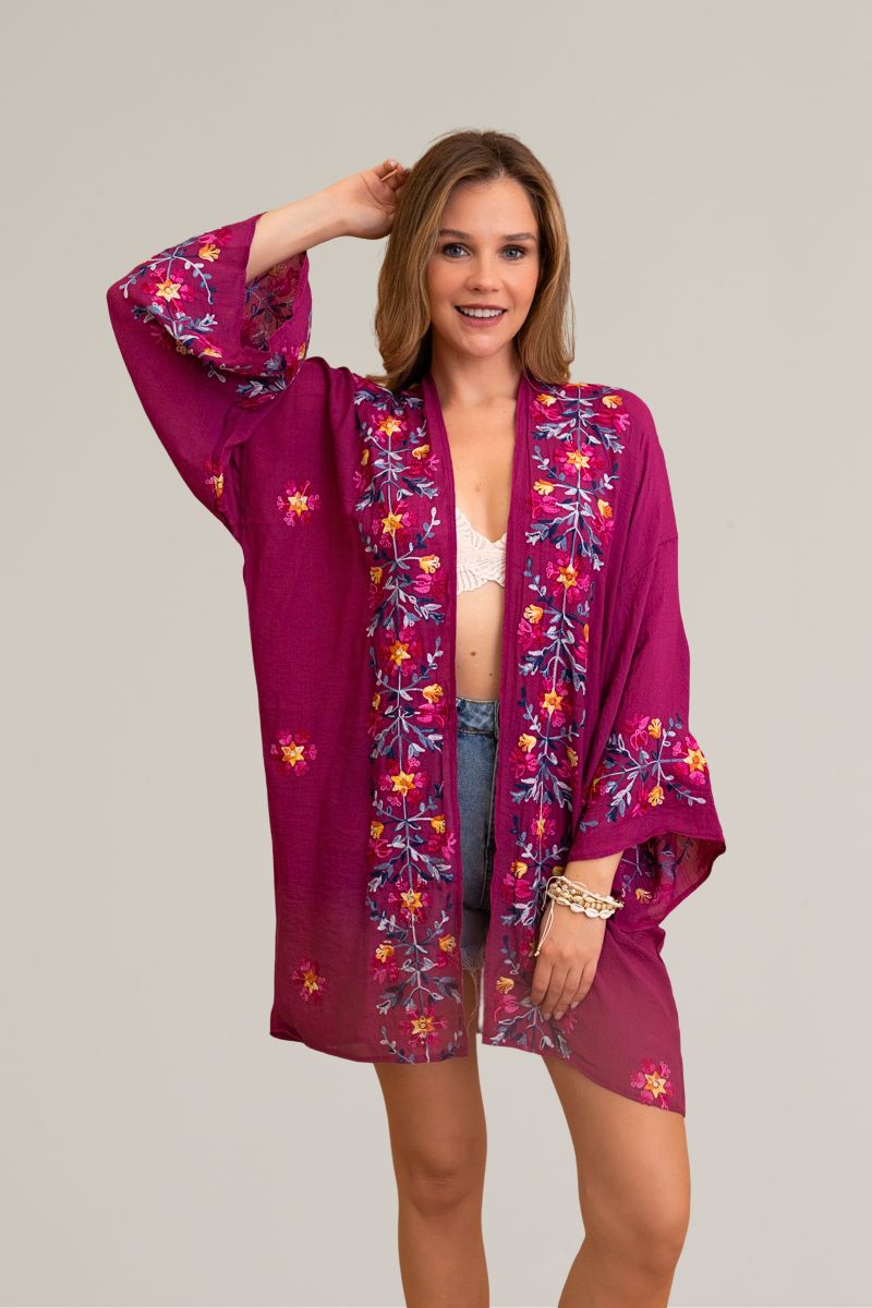 Open-front floral fuchsia kimono with soft viscose polyester blend.