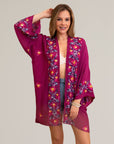 Open-front floral fuchsia kimono with soft viscose polyester blend.