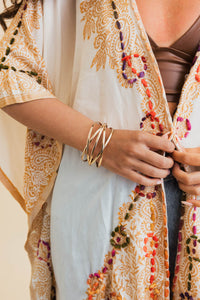 Retro metallic cuff gold bangle armband with copper design.