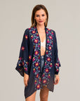 Sophisticated floral navy kimono wrap with intricate details.