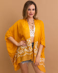 Sophisticated mustard floral kimono with lightweight and durable design.