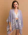 Stylish Enchanted Bloom Blue kimono perfect for layering and comfort.