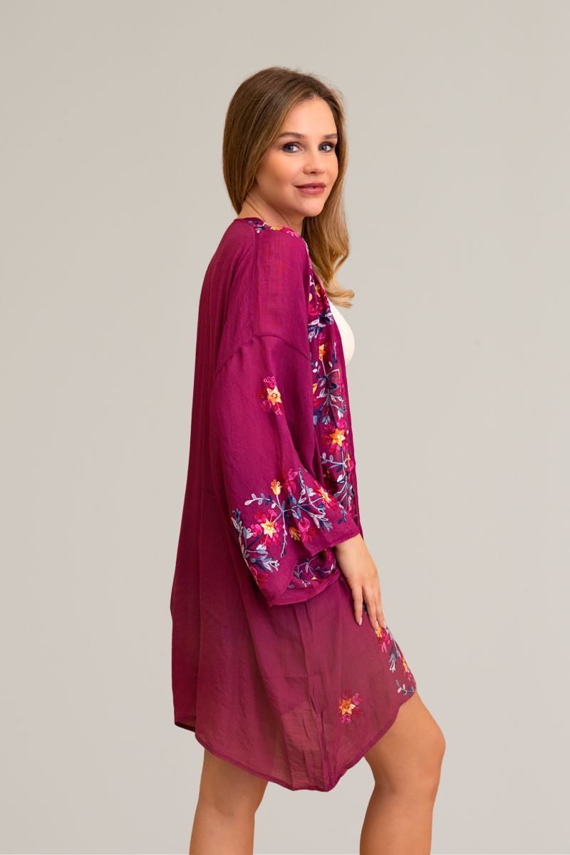 Trendy anemone embroidered fuchsia kimono, perfect for any look.