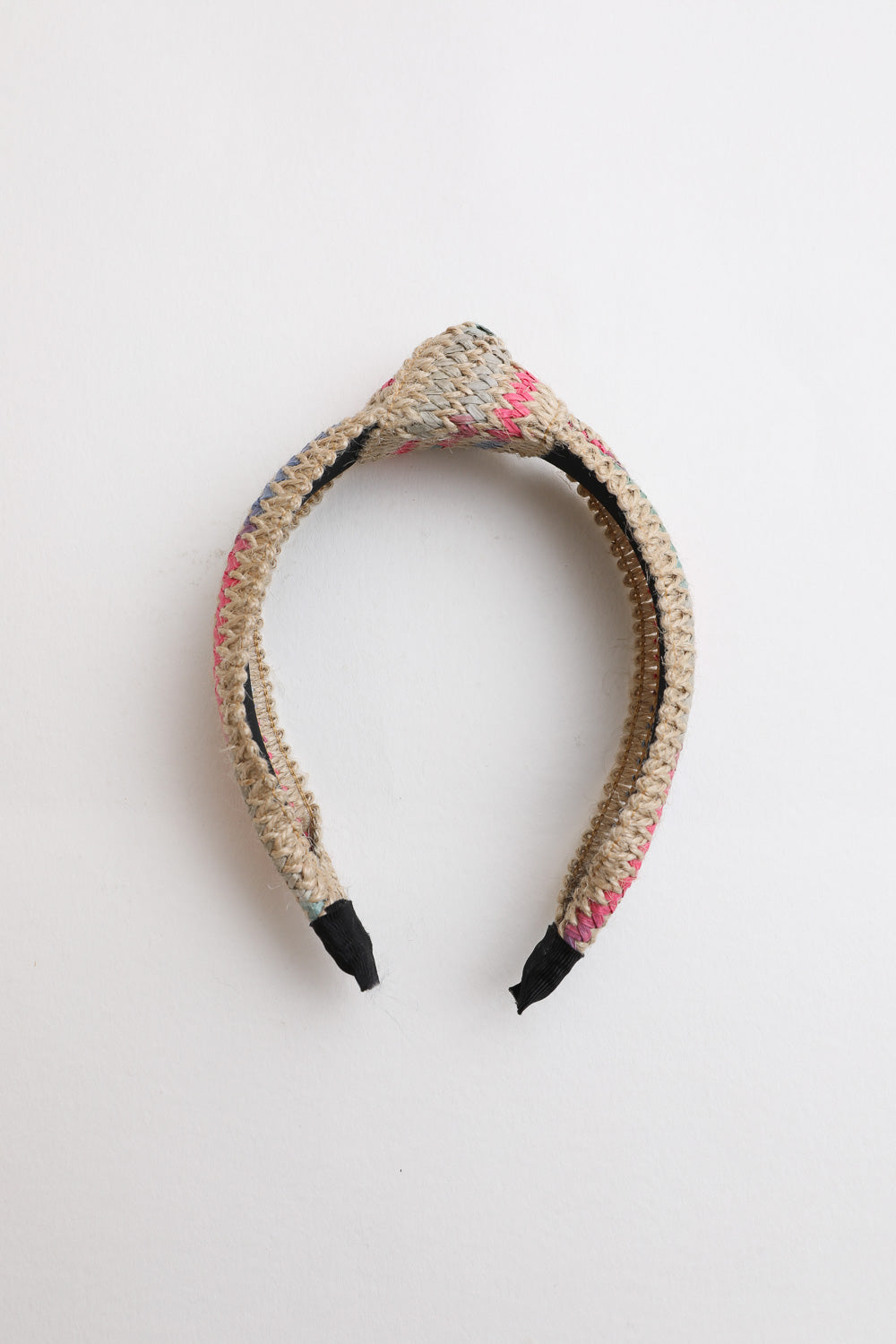 Twine woven knotted pink headband, versatile and trendy.