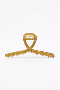 Twisted fun wood grain metal hair claw clip, durable and stylish.