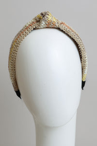 Versatile twine woven knotted yellow natural headband.