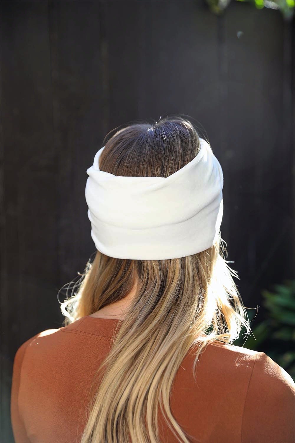 Chic twist knot ivory headbands with soft and stretchy fit.