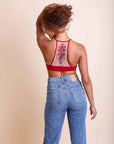 Embroidered mesh red racerback bralette with tattoo-inspired design.