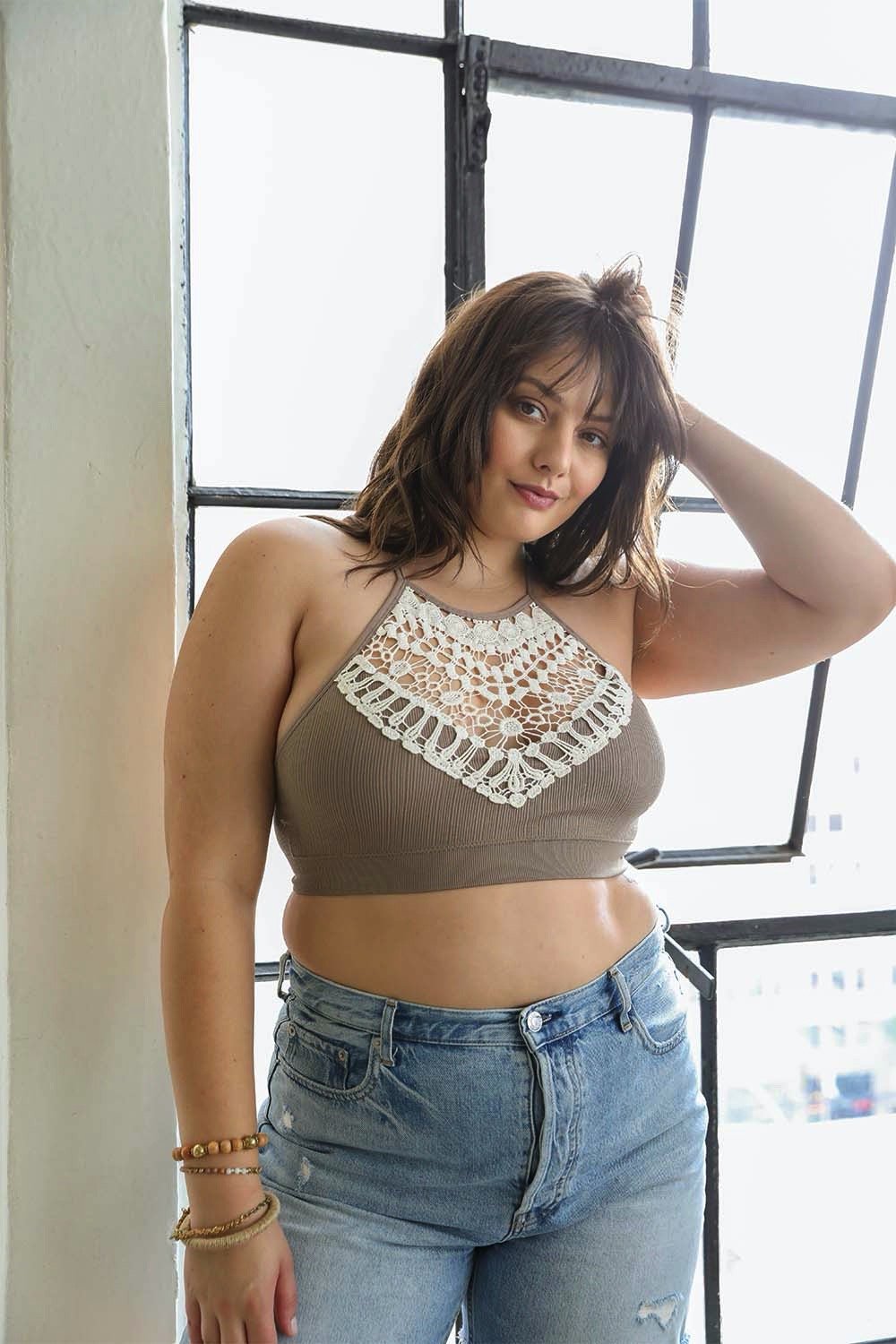 Feminine crochet lace mocha bralette with high neck and breathable fit.