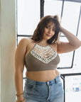 Feminine crochet lace mocha bralette with high neck and breathable fit.