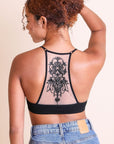 Lightweight tattoo back black bralette with seamless design.