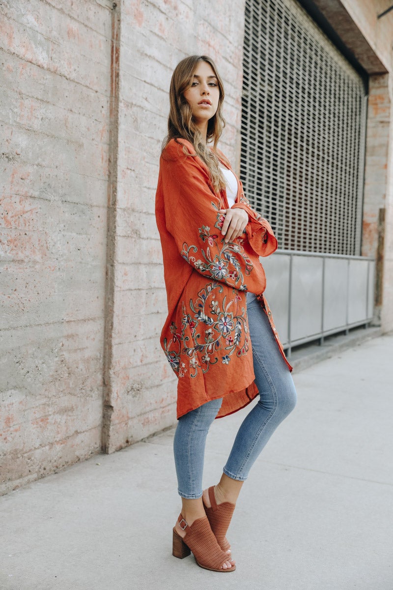 Long rust floral kimono cardigan with lightweight elegant design.