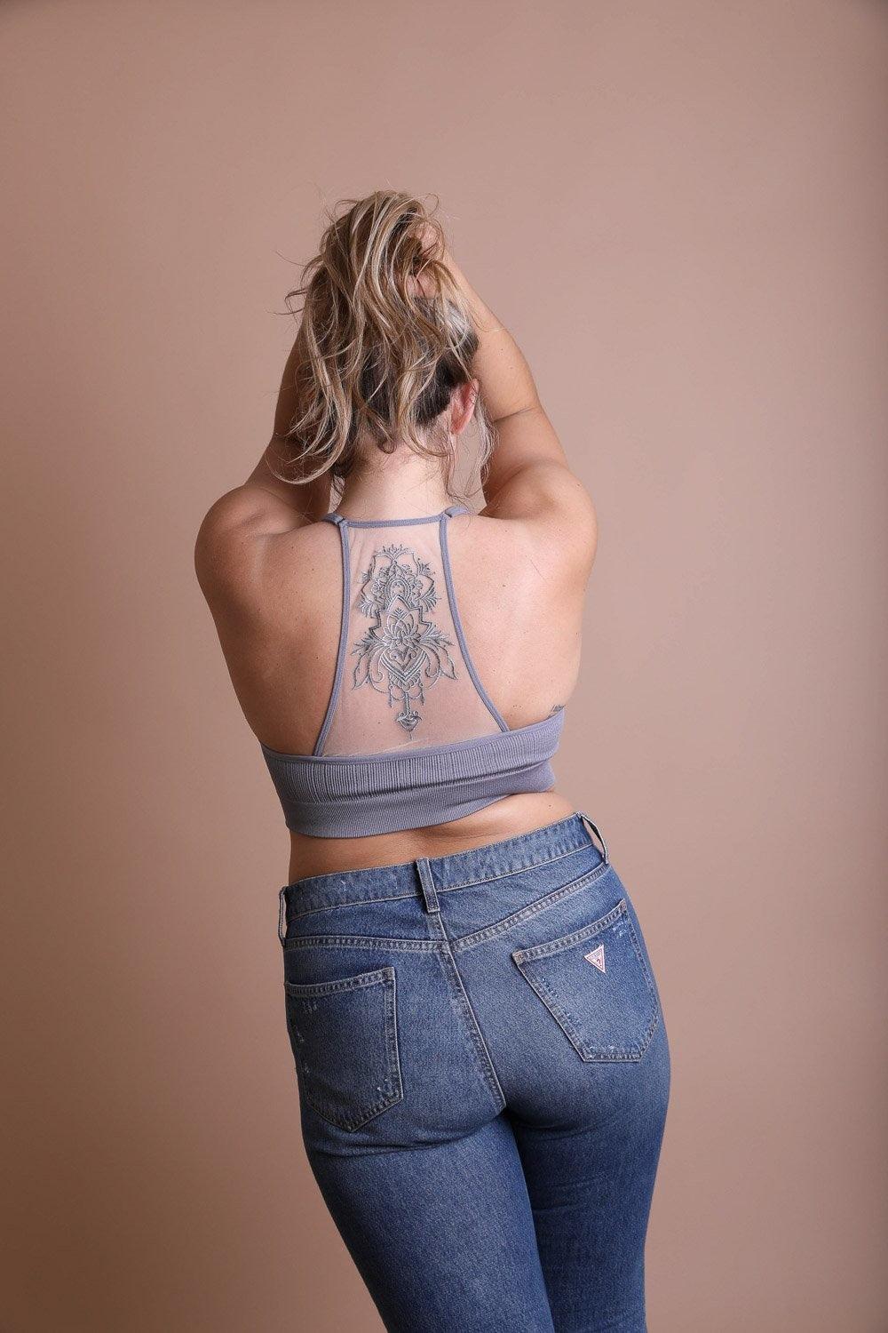 Seamless tattoo back gray bralette with breathable mesh.