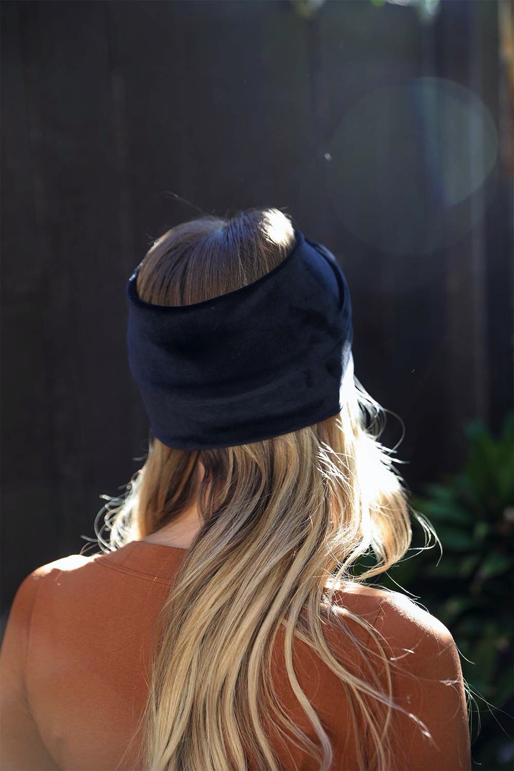 Soft and versatile black headbands with chic twist detail.