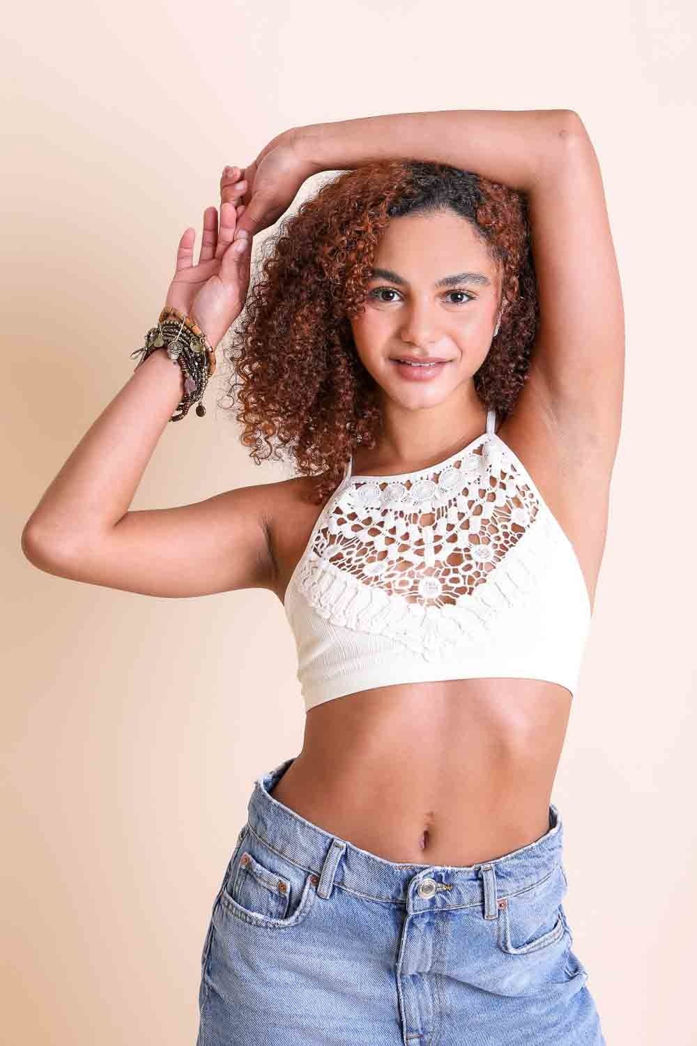 Soft crochet lace high neck ivory bralette with elegant fit.