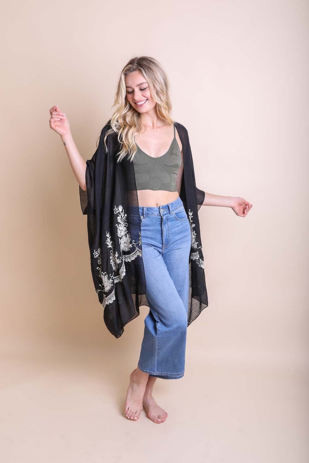 Sophisticated floral black kimono with lightweight and breathable design.