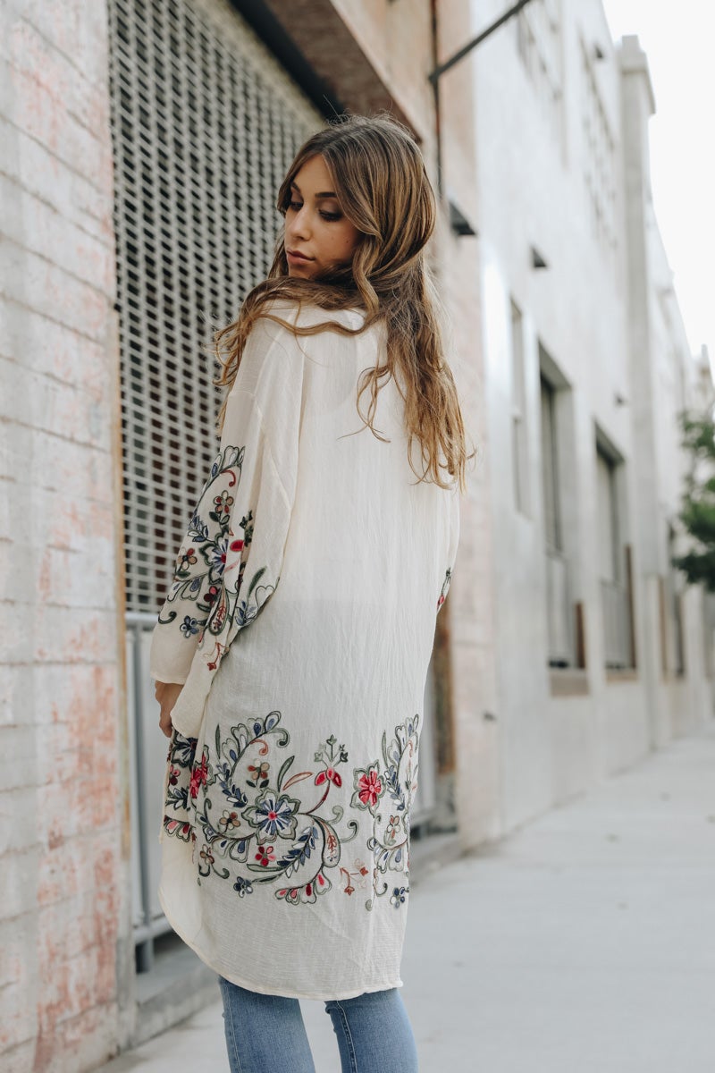 Sophisticated long floral white kimono cardigan for versatile styling.