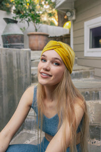 Stretchy fabric twist knot mustard headbands for women.