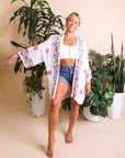 Stylish and comfortable flower garland white kimono design.