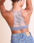 Tattoo back gray bralette with mesh detail for layering.