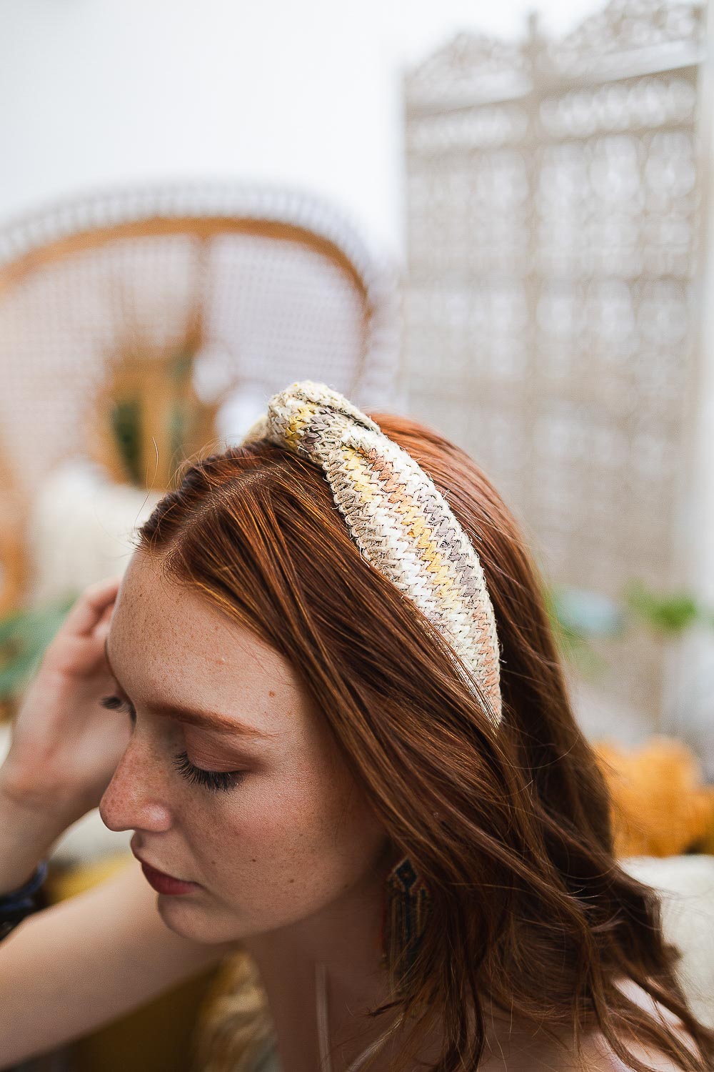 Textured woven knotted yellow headband, durable and comfortable.