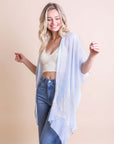 Versatile floral embroidered blue kimono made with soft and durable fabric.