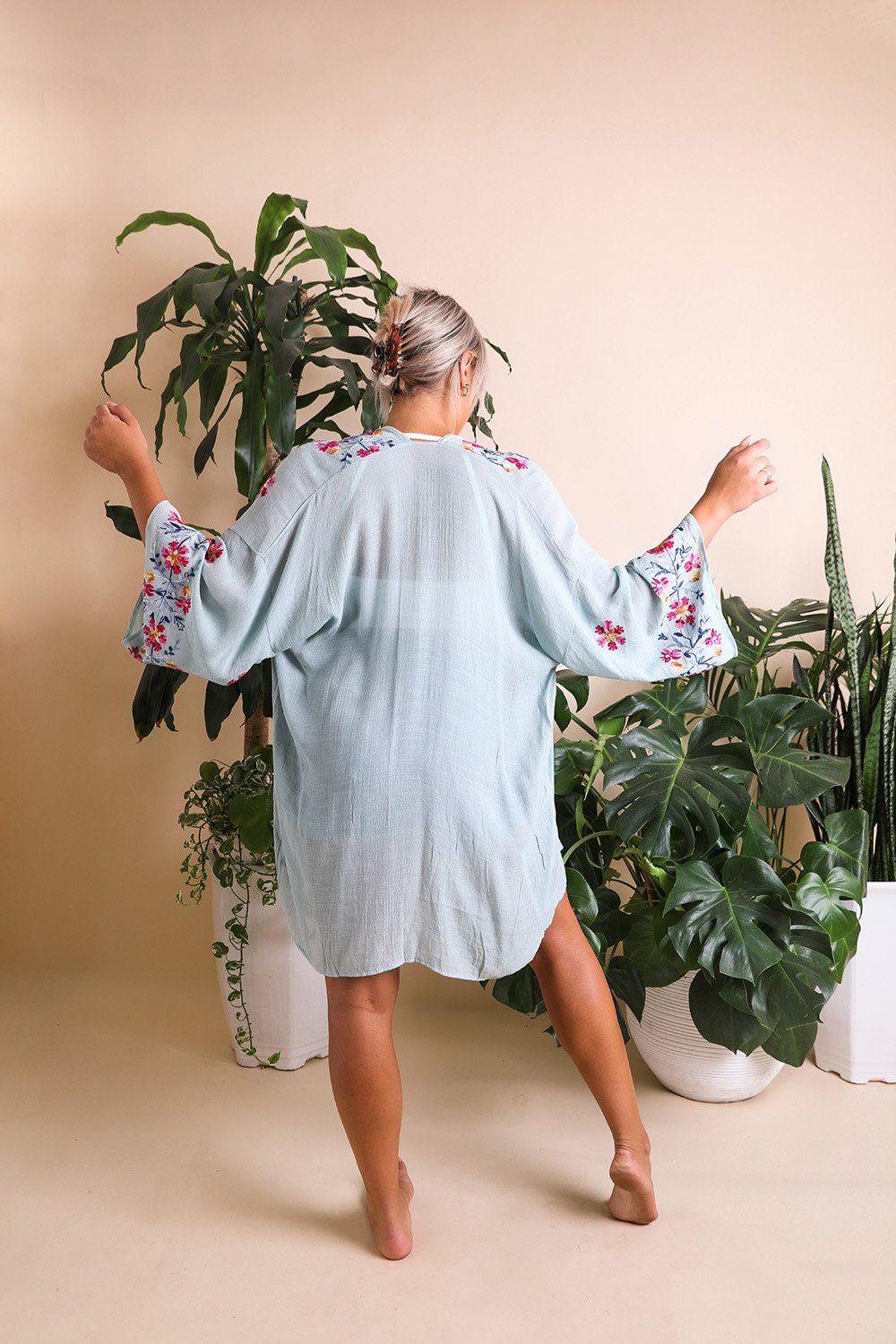 Versatile floral embroidered sage kimono suitable for all occasions.