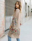 Versatile mocha floral kimono cardigan crafted with soft viscose blend.